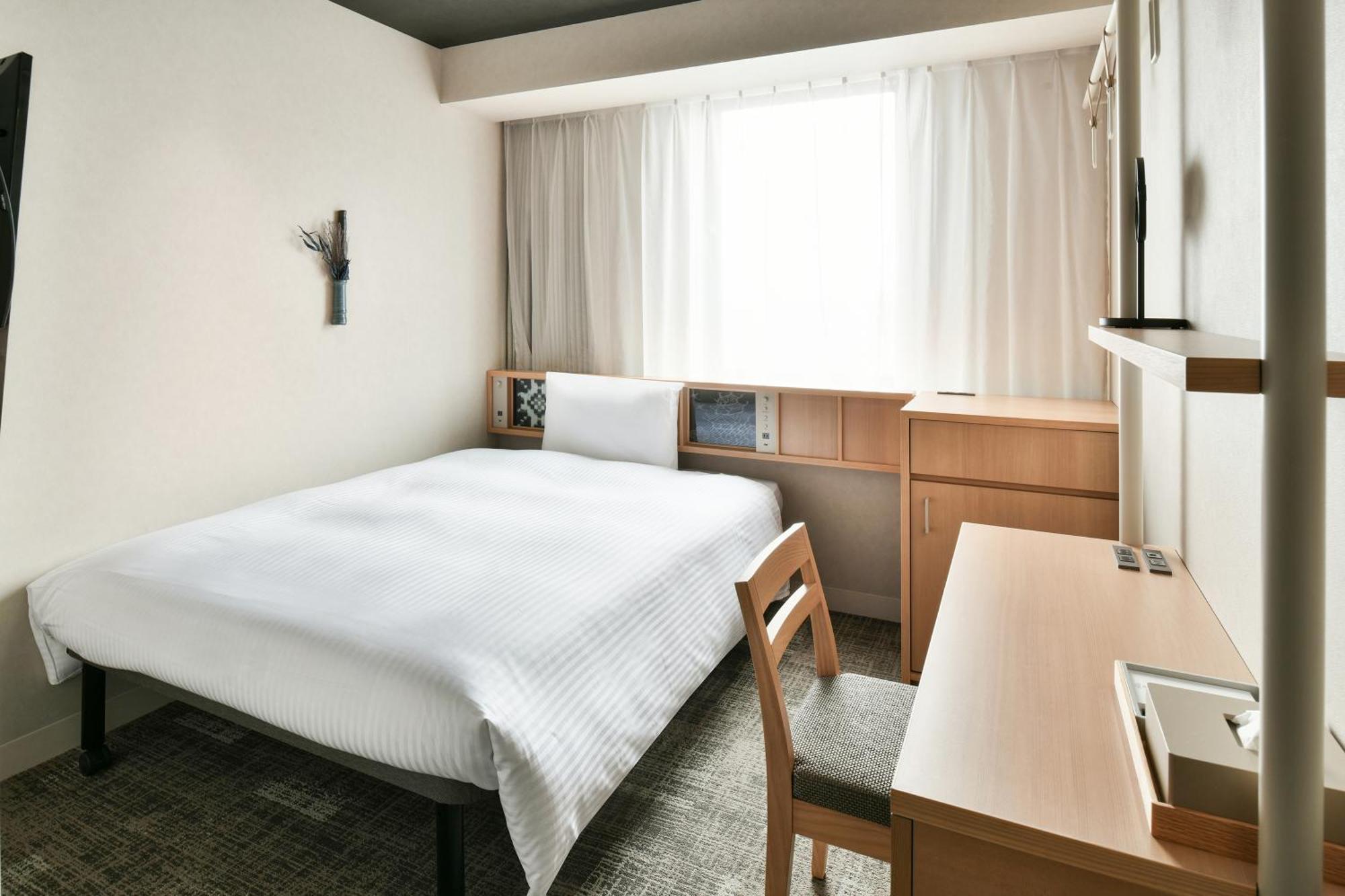Ref Matsuyama City Station By Vessel Hotels Bagian luar foto